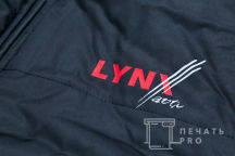 Черные жилеты с надписью «LYNX»